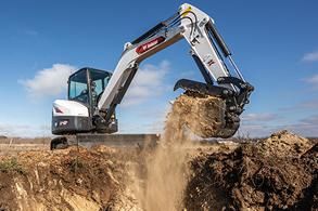 TNT Excavating LLC compact excavator at work